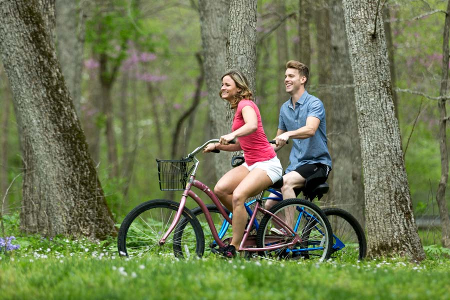 Couple Bike Riding at Dogwood Canyon