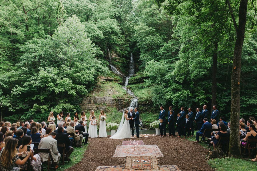 Wedding ceremony in front of waterfall